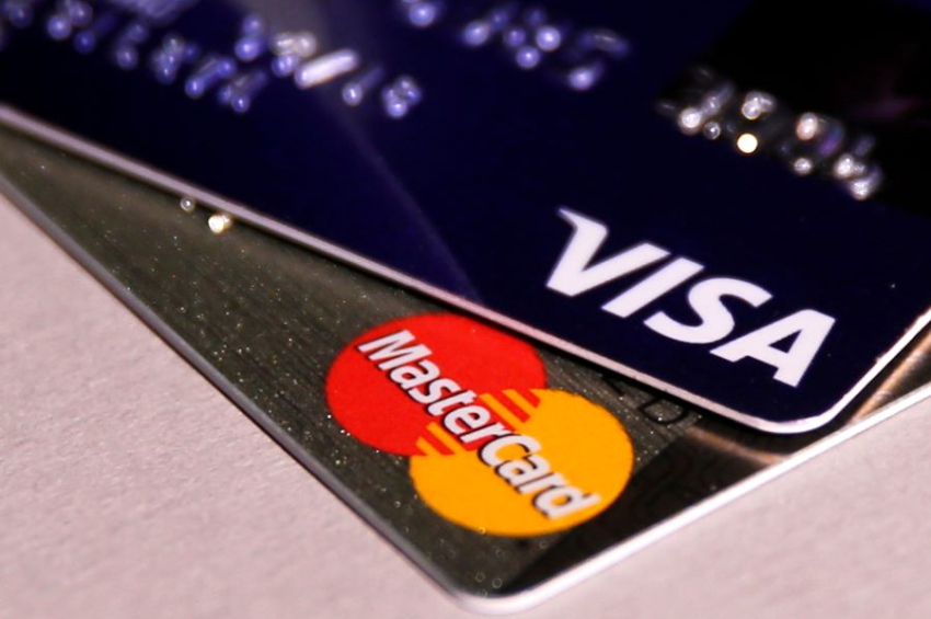Visa and Mastercard agreed to reduce credit card interchange fees