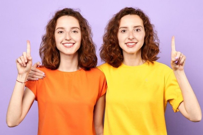 Why do identical twins have different fingerprints?